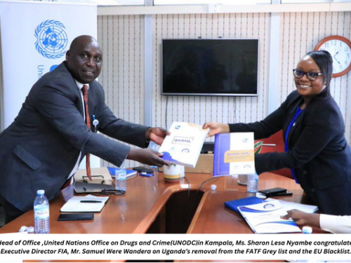 The Head of Office, United Nations Office on Drugs and Crime(UNODC)in Kampala, Ms. Sharon Lesa Nyambe congratulates the Executive Director FIA, Mr. Samuel Were Wandera on Uganda’s removal from the FATF Grey list and the EU Blacklist.